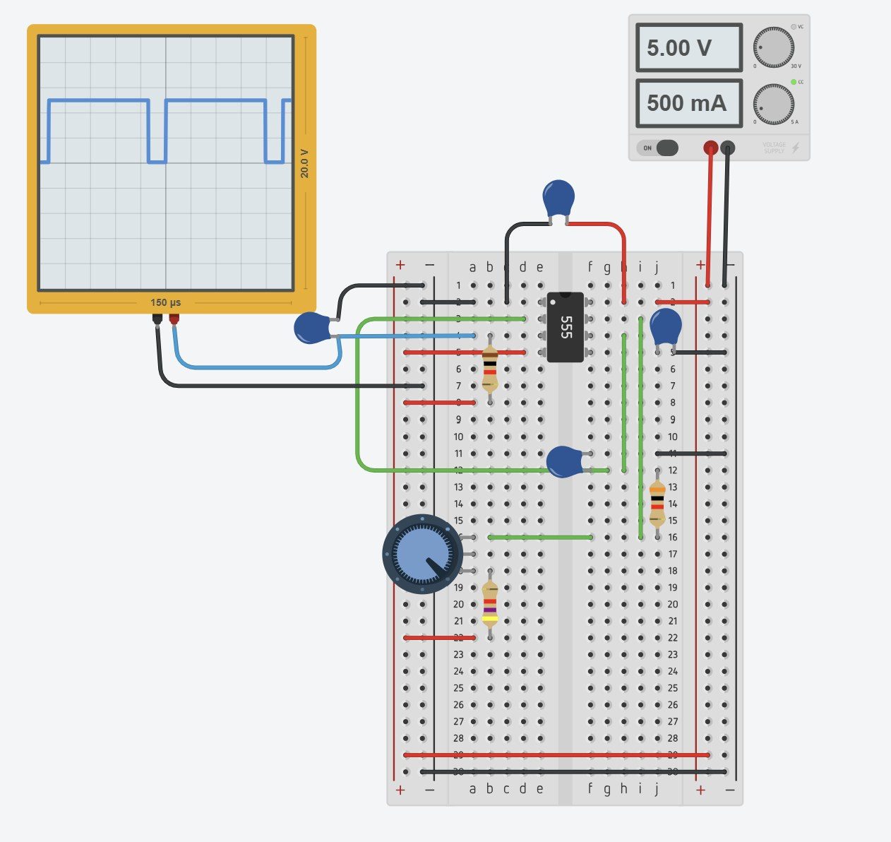 Simulated analog 555 oscillator circuit with an oscilloscope trace
